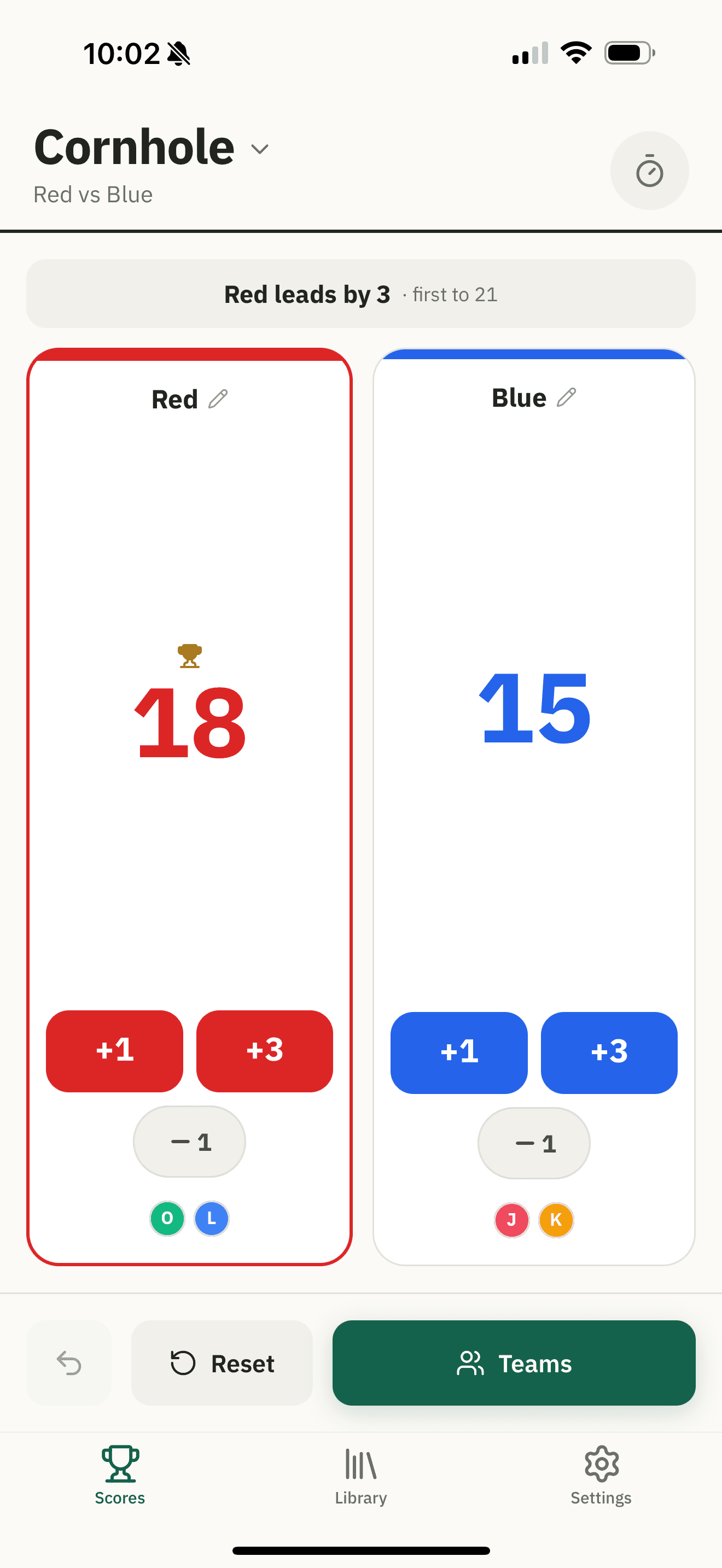 A game of Cornhole on the head-to-head board: Red 18, Blue 15, a banner reading Red leads by 3, first to 21, and +1 and +3 buttons under each side.
